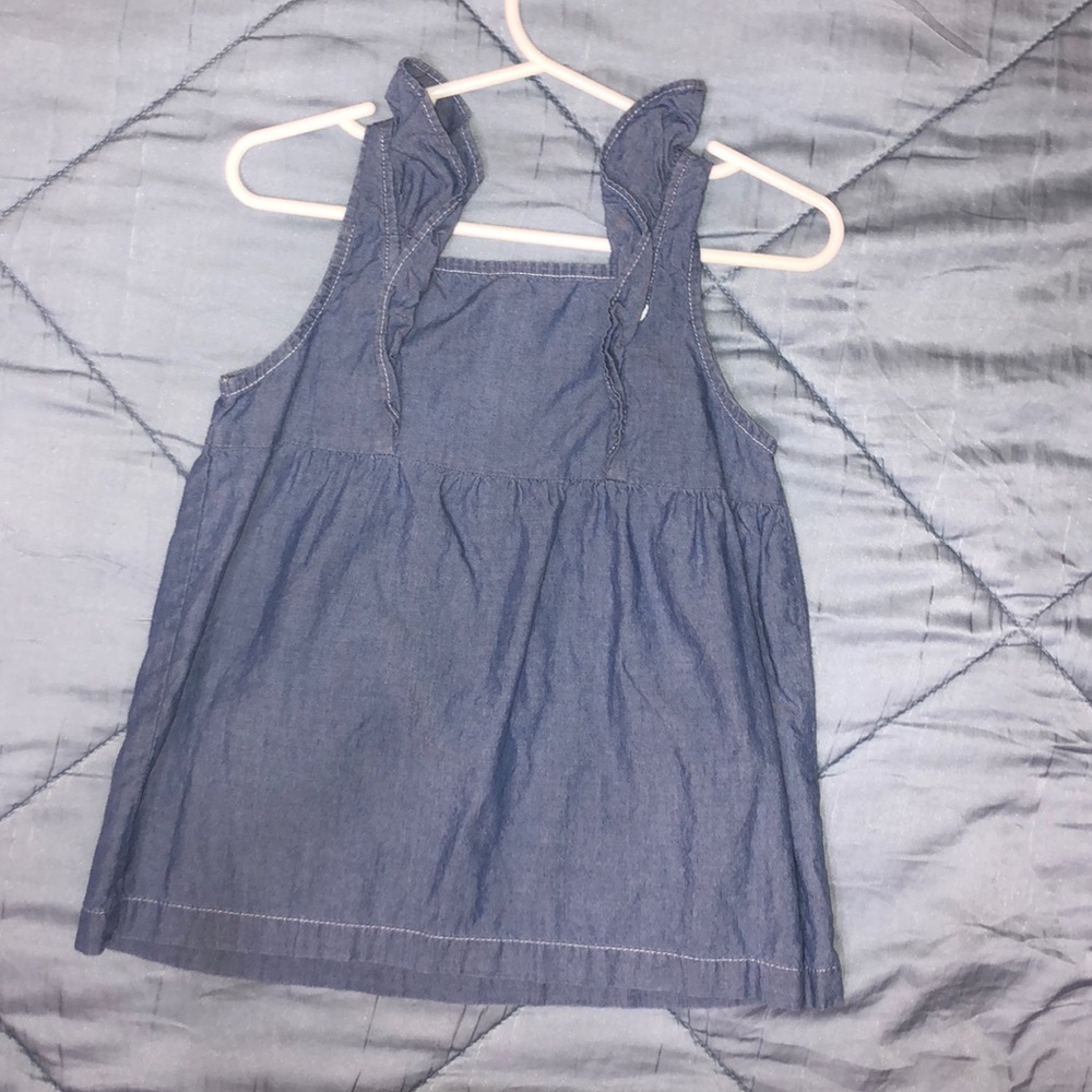 Brand new denim blouse.